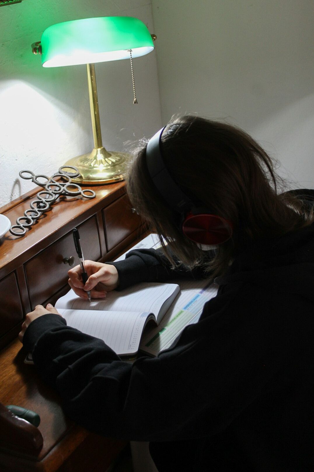 writer at desk with manuscript